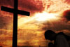 KneelingAtTheCross