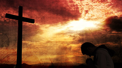 Kneeling At The Cross