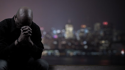 Man Praying For City