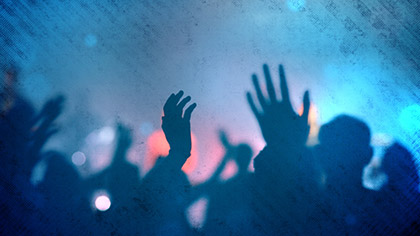 Worship Group Hands Blue Filtered